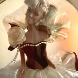 Elegant Black and White Doll with Dress